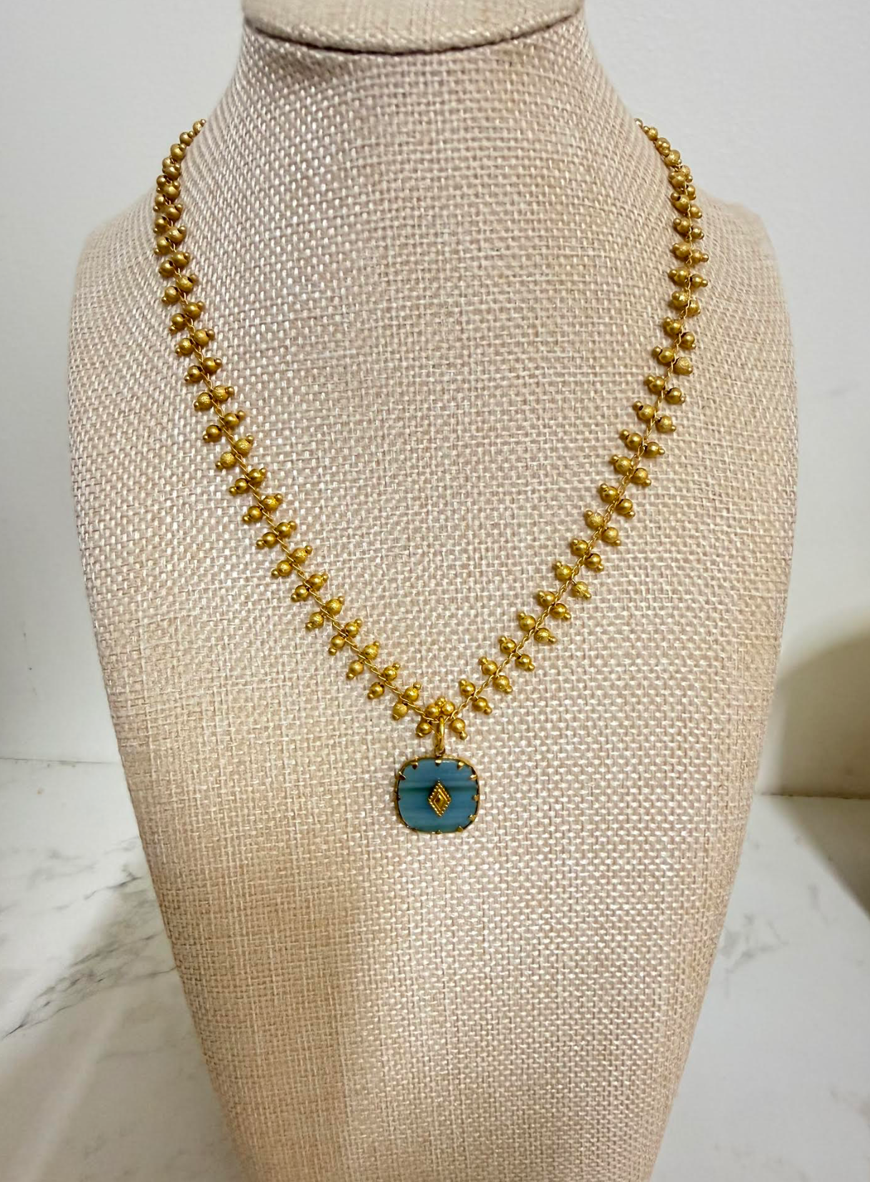 Green Pendent on Fringe Gold Chain